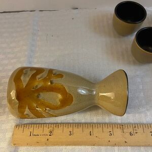 Pier 1 hand painted stoneware kioko saki set